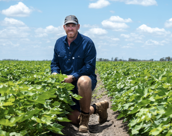 Aaron Kiely kneeling in field
