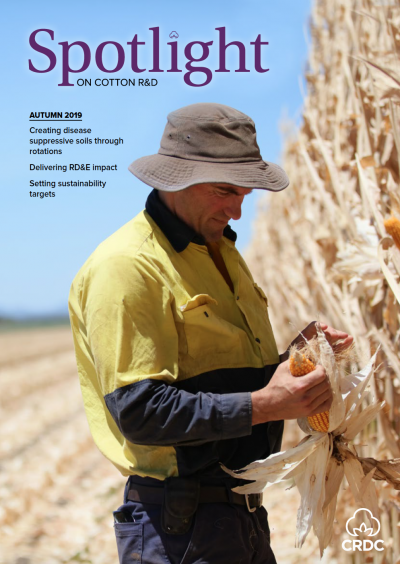 Cover of Spotlight Magazine - Autumn 2019. A farmer standing against a bale of hay.